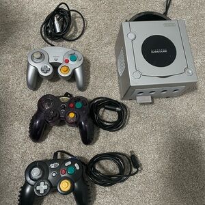 Nintendo GameCube Console with Silver and Black Controllers